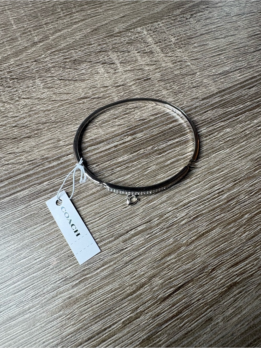 Coach Silver-Tone Bangle Bracelet with Charm
